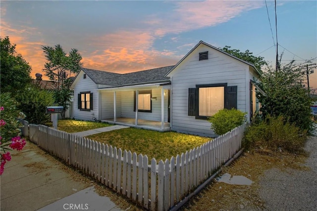 559 Edgar Ave Unit A2-282, Beaumont, CA 92223 - bungalow with a fenced front yard, covered porch, and a shingled roof