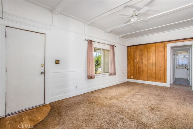 559 Edgar Ave Unit A2-282, Beaumont, CA 92223 - carpeted spare room with ceiling fan and wooden walls