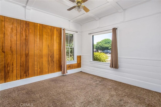 559 Edgar Ave Unit A2-282, Beaumont, CA 92223 - carpeted empty room with wooden walls and ceiling fan