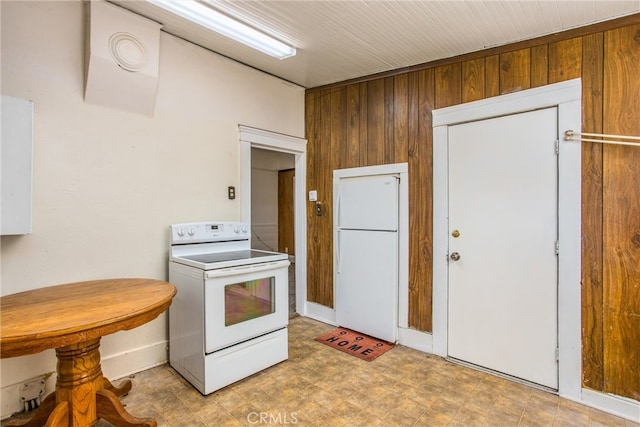 559 Edgar Ave Unit A2-282, Beaumont, CA 92223 - kitchen featuring white appliances, wooden walls, and light floors