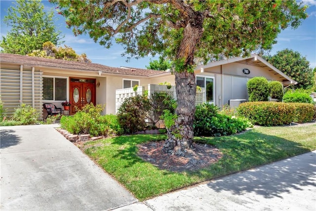 741 Avenida Majorca Unit B, Laguna Woods, CA 92637 - single story home with stucco siding and a front yard