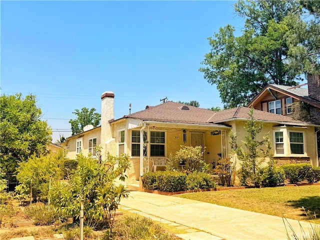 917 N Olive Ave, Alhambra, CA 91801 - view of front facade with a chimney and stucco siding