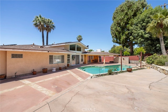 18409 Los Alimos St, Porter Ranch, CA 91326 - view of pool featuring a patio area and a fenced backyard