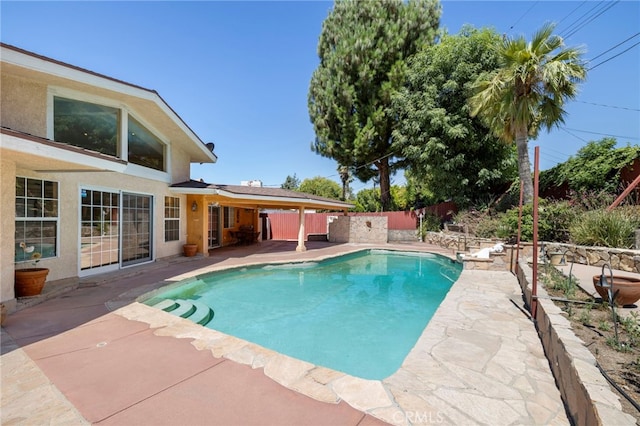 18409 Los Alimos St, Porter Ranch, CA 91326 - view of swimming pool with a patio and a fenced backyard