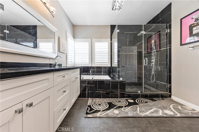 7020 Julie Ln, San Gabriel, CA 91775 - bathroom featuring vanity, a bath, and a shower stall