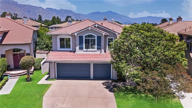 7020 Julie Ln, San Gabriel, CA 91775 - mediterranean / spanish-style house featuring a tile roof, a garage, driveway, a chimney, and stucco siding