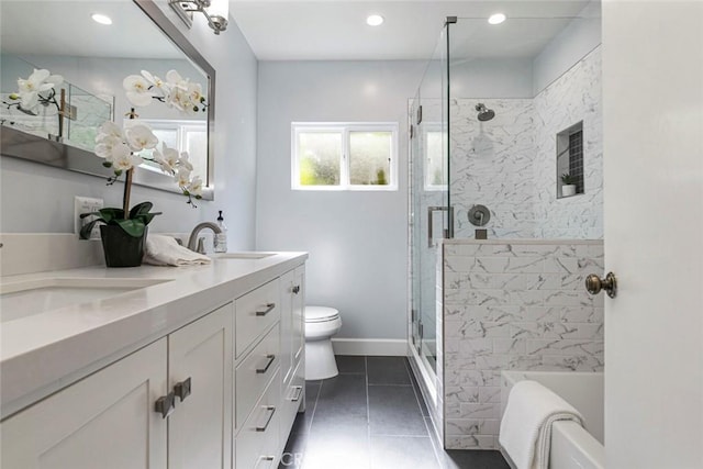 341 Cumberland Rd, Glendale, CA 91202 - full bathroom with double vanity, a bath, a stall shower, tile patterned flooring, and recessed lighting