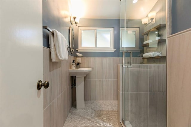 341 Cumberland Rd, Glendale, CA 91202 - full bathroom featuring a shower stall, tile walls, and wainscoting
