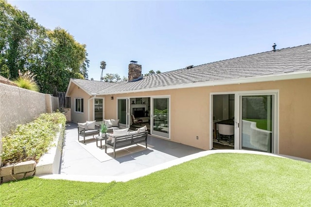 341 Cumberland Rd, Glendale, CA 91202 - back of house featuring stucco siding, outdoor lounge area, a chimney, and a patio
