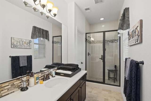 3024 Natureview Ct, Chula Vista, CA 91914 - bathroom featuring vanity, a shower stall, a chandelier, and recessed lighting