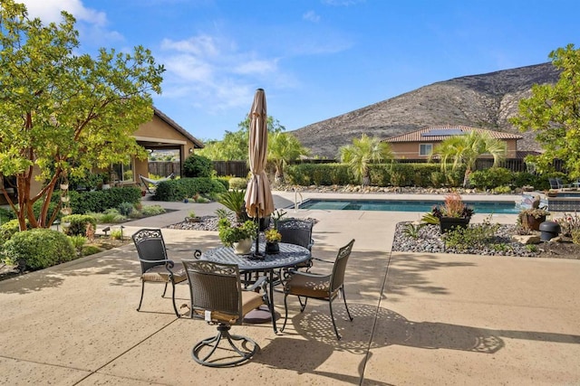 3024 Natureview Ct, Chula Vista, CA 91914 - view of patio with a mountain view and outdoor dining area