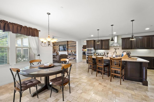 3024 Natureview Ct, Chula Vista, CA 91914 - dining room with stone tile flooring, a chandelier, and recessed lighting