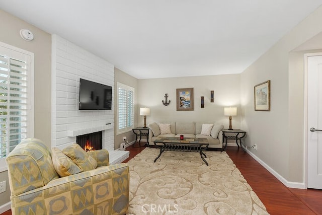 32332 Calle Linda, Dana Point, CA 92629 - living area with a brick fireplace and dark wood finished floors