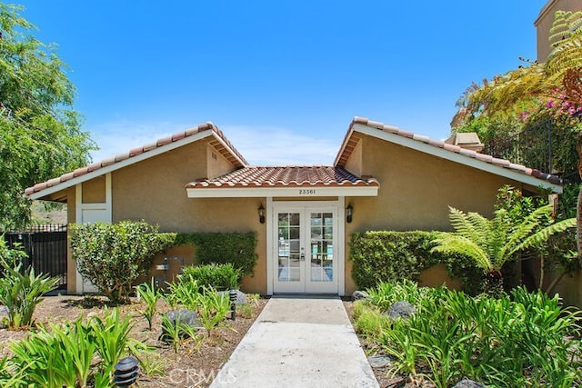 32332 Calle Linda, Dana Point, CA 92629 - entrance to property with french doors, stucco siding, and a tiled roof