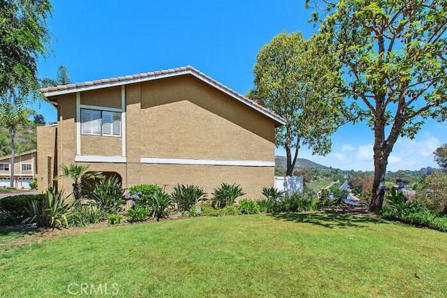 32332 Calle Linda, Dana Point, CA 92629 - view of side of home with a yard and stucco siding