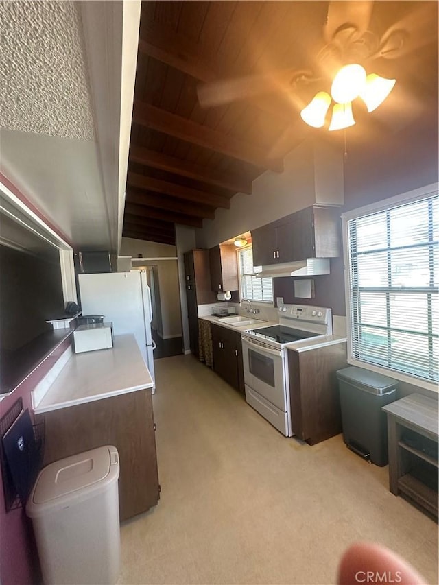 1024 W Pine St, West Covina, CA 91790 - kitchen with white appliances, wooden ceiling, light countertops, light carpet, and a ceiling fan