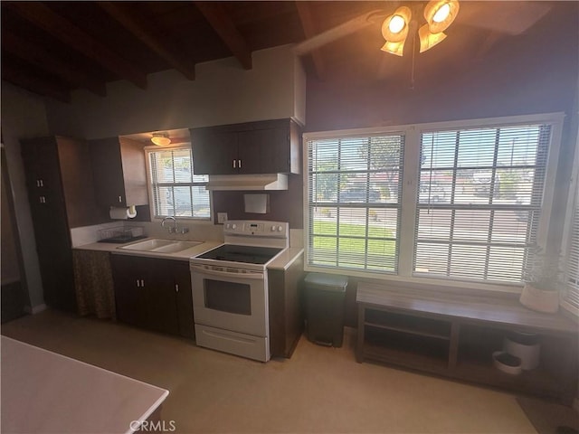 1024 W Pine St, West Covina, CA 91790 - kitchen featuring white electric range oven, beamed ceiling, light countertops, under cabinet range hood, and ceiling fan
