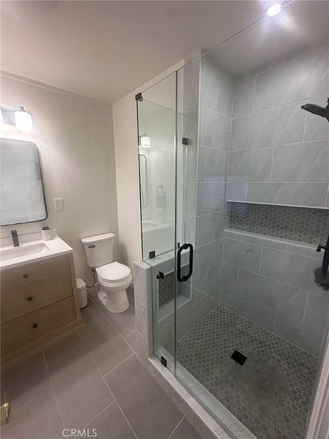 1024 W Pine St, West Covina, CA 91790 - bathroom featuring tile patterned flooring, a stall shower, and vanity