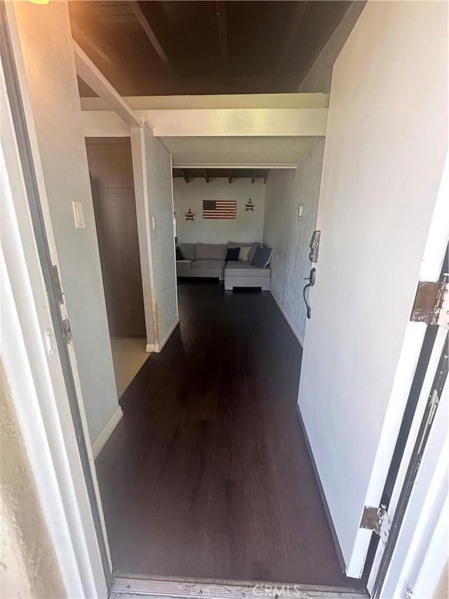1024 W Pine St, West Covina, CA 91790 - hallway featuring wood finished floors and baseboards