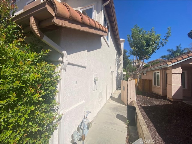 1853 Corte Pulsera, Oceanside, CA 92056 - view of side of home featuring stucco siding