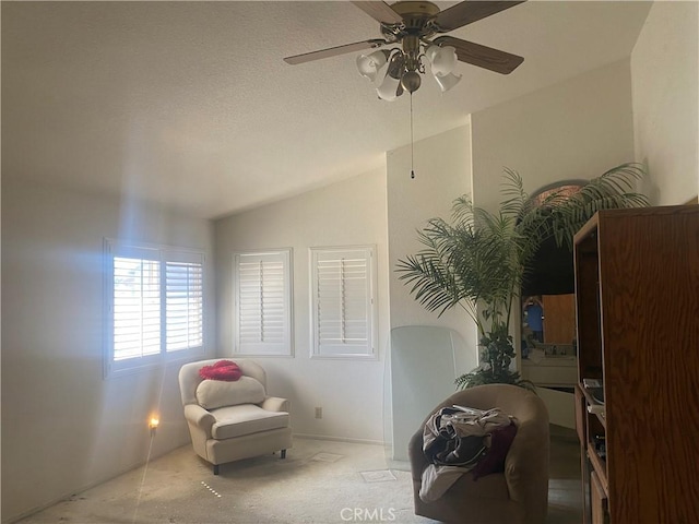 1853 Corte Pulsera, Oceanside, CA 92056 - sitting room featuring lofted ceiling, ceiling fan, and carpet