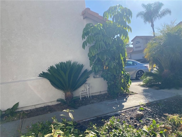 1853 Corte Pulsera, Oceanside, CA 92056 - view of side of property with stucco siding