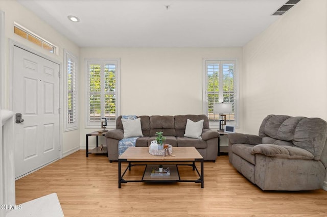 489 W Summerfield Cir, Anaheim, CA 92802 - living room with light wood-style floors and recessed lighting