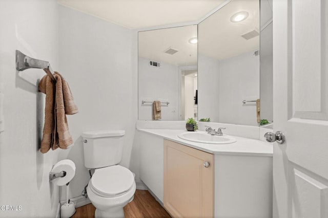 489 W Summerfield Cir, Anaheim, CA 92802 - half bathroom featuring vanity, wood finished floors, and recessed lighting