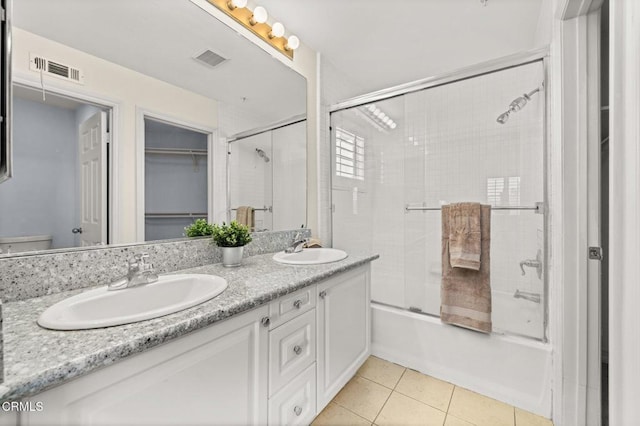 489 W Summerfield Cir, Anaheim, CA 92802 - bathroom featuring shower / bath combination with glass door, double vanity, and tile patterned flooring
