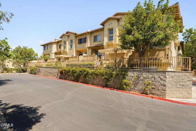 489 W Summerfield Cir, Anaheim, CA 92802 - view of building exterior with a residential view