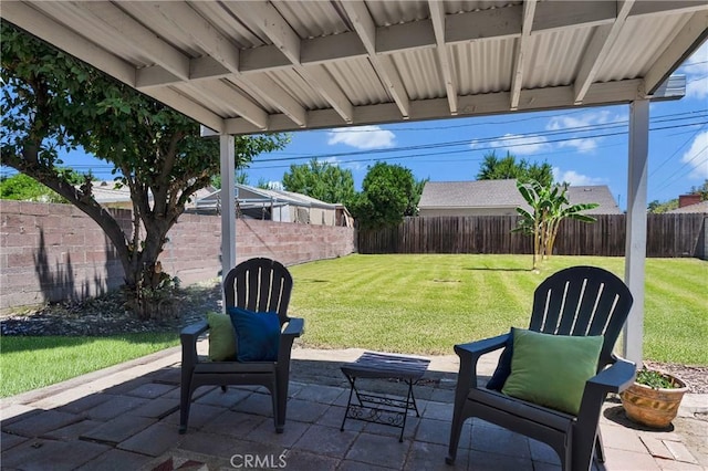 6032 Coke Ave, Long Beach, CA 90805 - fenced backyard featuring a patio area