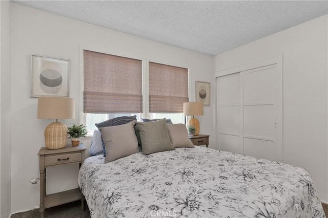 6032 Coke Ave, Long Beach, CA 90805 - bedroom featuring carpet floors, a textured ceiling, and a closet