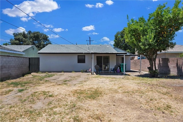 6032 Coke Ave, Long Beach, CA 90805 - back of house with a patio area and stucco siding