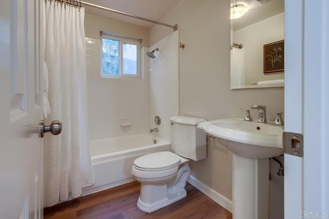 11033 Scripps Ranch Blvd, San Diego, CA 92131 - bathroom featuring shower / bath combination with curtain and wood finished floors