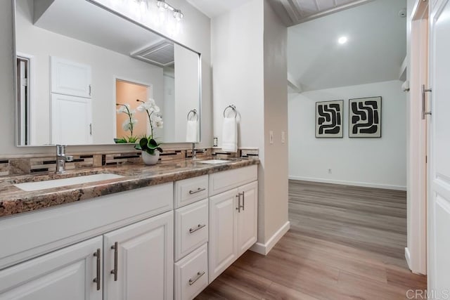 11033 Scripps Ranch Blvd, San Diego, CA 92131 - full bath featuring double vanity and wood finished floors
