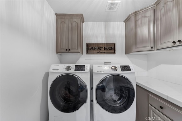 31675 Via Pato, Coto De Caza, CA 92679 - laundry room with washing machine and dryer and cabinet space