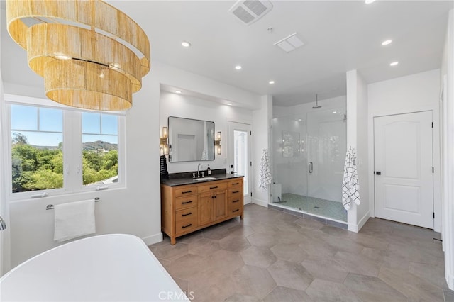 31675 Via Pato, Coto De Caza, CA 92679 - full bath with a shower stall, a soaking tub, vanity, recessed lighting, and tile patterned flooring