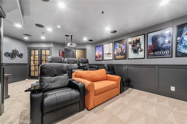 31675 Via Pato, Coto De Caza, CA 92679 - home theater featuring light carpet, a decorative wall, recessed lighting, and wainscoting
