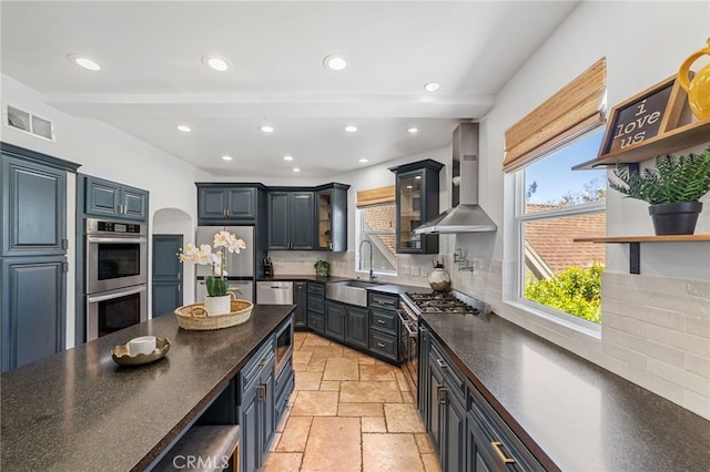 31675 Via Pato, Coto De Caza, CA 92679 - kitchen featuring wall chimney exhaust hood, open shelves, appliances with stainless steel finishes, healthy amount of natural light, and recessed lighting
