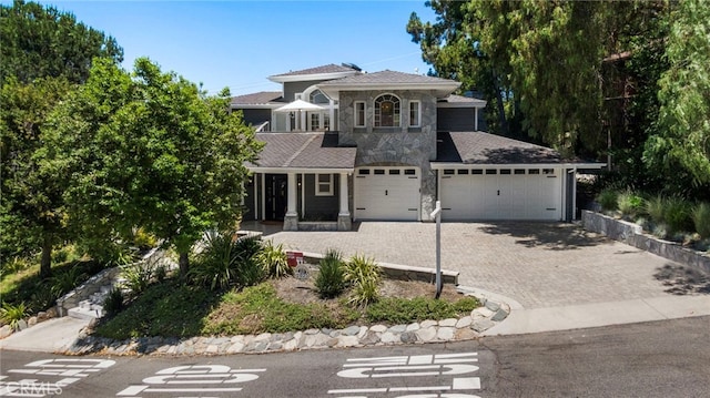 31675 Via Pato, Coto De Caza, CA 92679 - view of front of property with decorative driveway, stone siding, and a garage