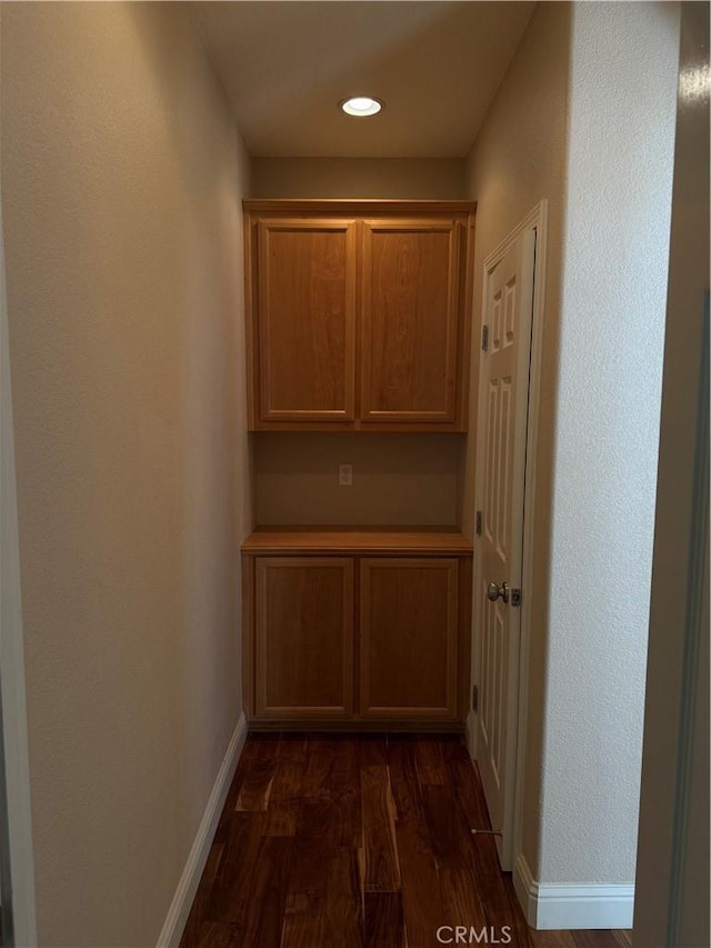 4125 Sattui Ct, Merced, CA 95348 - corridor featuring dark wood finished floors and recessed lighting