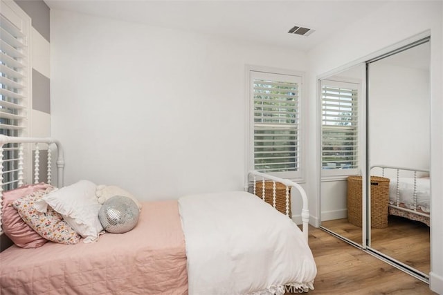 42 Livingston Pl, Ladera Ranch, CA 92694 - bedroom with wood finished floors and a closet