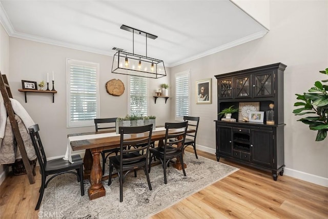 42 Livingston Pl, Ladera Ranch, CA 92694 - dining room with light wood-style floors and ornamental molding