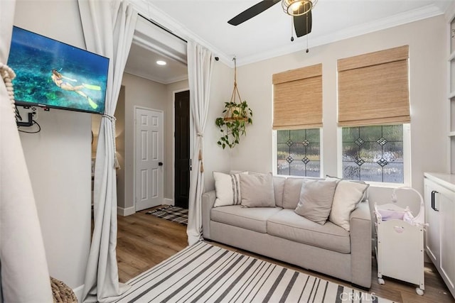 42 Livingston Pl, Ladera Ranch, CA 92694 - living room featuring crown molding, wood finished floors, ceiling fan, healthy amount of natural light, and recessed lighting