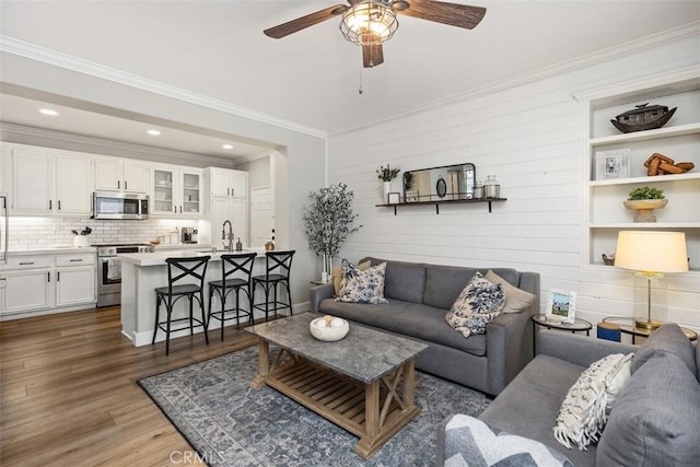 42 Livingston Pl, Ladera Ranch, CA 92694 - living area with ornamental molding, a ceiling fan, dark wood-style floors, and recessed lighting