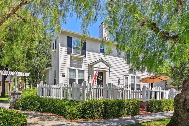 42 Livingston Pl, Ladera Ranch, CA 92694 - view of front of property with a fenced front yard and a chimney