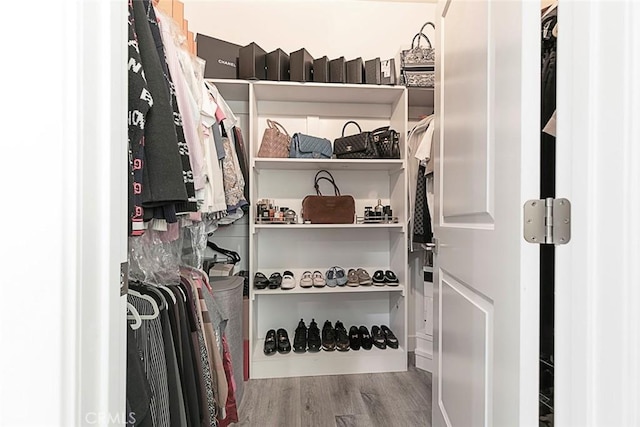 9124 N Nilo Ln, Panorama City, CA 91402 - spacious closet featuring wood finished floors