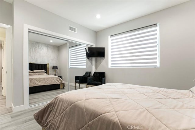 9124 N Nilo Ln, Panorama City, CA 91402 - bedroom with a closet, wood finished floors, and recessed lighting