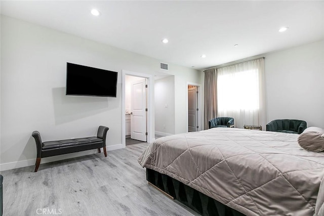 9124 N Nilo Ln, Panorama City, CA 91402 - bedroom featuring light wood finished floors and recessed lighting