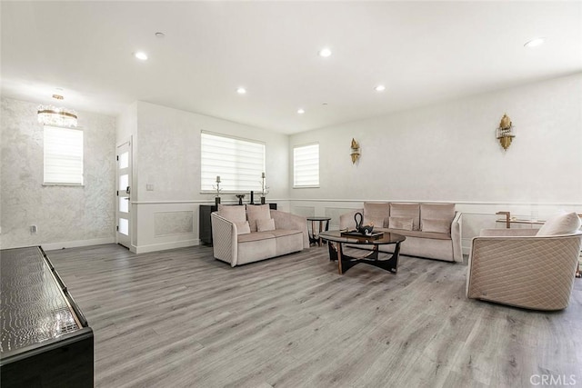 9124 N Nilo Ln, Panorama City, CA 91402 - living room with wood finished floors, a chandelier, and recessed lighting